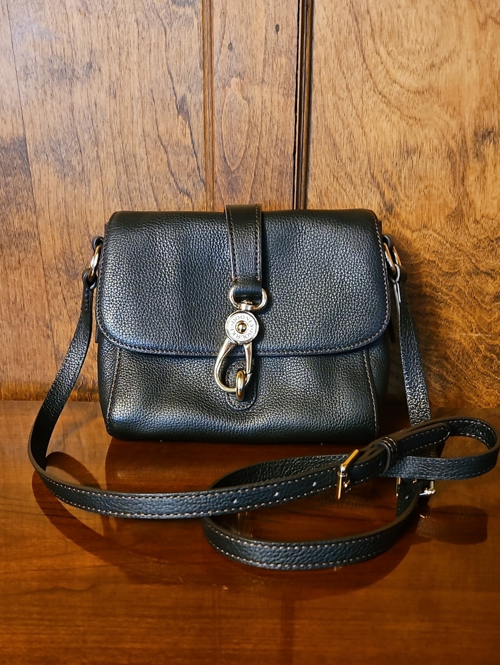 Dooney & Burke Black Pebbled Leather Crossbody Bag with Gold Accent